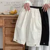 Pantalones casuales de pierna recta para niño, primavera y otoño 2026 nuevos pantalones casuales holgados de pierna ancha, pantalones para niños en beige