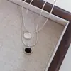 Collar de hueso de serpiente con colgante ovalado geométrico de ágata negra para mujer estilo coreano ins estilo simple retro francés lujo ligero Avanzado