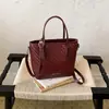 Bolso de lujo de alta gama para mujer, nuevo y moderno de verano 2026, bolso de hombro vintage para el día a día, bolso tipo cubo cruzado
