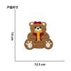 Otoño e invierno al por mayor bordado a máquina dibujos animados oso serie navideña pegatinas de tela ropa accesorios de equipaje parche