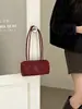 Bolso Retro Boston estilo 2026 nuevo, hecho de piel de flor, bolso cilíndrico suave casual, bolso de hombro para mujer, bolso de axila de piel genuina