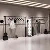 Estante de Exhibición para Tienda de Ropa de Hierro Minimalista Negro Montado en Pared Perchero de Ropa para Tienda de Ropa de Mujer Estante de Ropa de Pared Modelo Nuevo