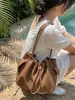Bolsa de Ombro Plissada Minimalista Transfronteiriça Nova Coleção Primavera 2026 Nicho de Alto Valor, Bolsa Tote de Braço Estilo Relaxado para Mulheres