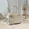 Bolsa de Mão de Couro com Cera de Óleo Retrô Feminina 2026 Primavera Novo Estilo Nicho Popular Bolsa de Ombro Único Transversal Bolsa Pequena de Alto Valor