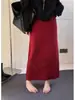 Falda de ganchillo calada de alta resistencia para mujer, nuevo estilo coreano otoño e invierno 2026, falda recta de felpa de alta gama de longitud media