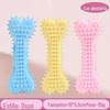 Brinquedos para animais de estimação transfronteiriços TPR Foam Flat Bone Rugby Flutuante Água Brinquedos para cães Molar Dental Cleaning Brinquedos para cães