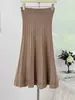 Falda de punto simple casual de color liso estilo coreano, nueva de otoño 2026, de cintura alta, corte ajustado, línea A, recta