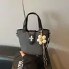 Bolsa de mão tipo balde feminina, nova tendência primavera-verão 2026, bolsa de ombro nicho para trabalho e deslocamento, bolsa transversal