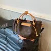 Bolso Cubo Versátil de Estampado Retro de Alta Calidad Transfronterizo para Mujer Modelo Nuevo 2026 con Textura Premium Ligero Bolso de Hombro para Viajes