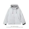 Chaqueta softshell súper elegante de estilo americano, un conjunto de escalada al aire libre con capucha para parejas, a prueba de viento y forrado de polar, corte holgado, disponible para hombres y mujeres.