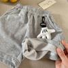 Pantalones cortos para niños 2025 entrecerrando los ojos verano nuevo niños y niñas pantalones cortos de dibujos animados tridimensionales pantalones casuales para bebé moda