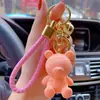 Llavero de resina de oso de la suerte de dibujos animados original para mujer, lindo, creativo, exquisito, para llave de coche, colgante de bolso, venta al por mayor