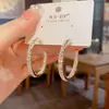 Pendientes de Aro Europeos y Americanos Transfronterizos Únicos Exagerados de Circonita en Forma de C con un Diseño de Lujo Ligero y Único, Pendientes de Estilo Minimalista al por Mayor