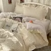 Juego de cuatro piezas floral 100% algodón Clase A, ropa de cama de algodón lavado, funda de edredón de encaje estilo coreano, funda de edredón y sábana de algodón puro