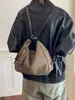 Mochila de Felpa de Gamuza Súper Caliente para Mujer 2026 Nueva de Gran Capacidad Bolso de Hombro Retro Mate Versátil para Viajar Bolso Cruzado