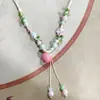 Collar con colgante de campana de mariposa de cerámica de estilo étnico retro para mujer, diseño nuevo y moderno, cadena larga para suéter, accesorios