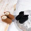 Botas de nieve para niños y niñas 2026 nuevos zapatos de algodón cálido de felpa de invierno zapatos de bebé botas cortas impermeables para niñas