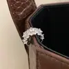 Pendiente de clip C hueco de diseño de lujo de nicho de alta gama con circonita incrustada para mujer, personalizado, versátil, pendientes para el uso diario