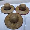 Xia Tianping junto con las damas vaqueras texto inglés sombrero sombrero para el sol sombrero de paja ala ancha viaje ocio fabricantes de sombreros para mujeres venta al por mayor