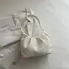 Bolsa de ombro feminina, simples e versátil, versão coreana de nicho 2026, bolsa de axila plissada suave de cor sólida, bolsa minimalista