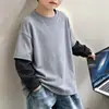 Roupa Íntima Masculina de Lã Patchwork Estilosa Outono Inverno 2026 Nova Média Grande Infantil Quente Gola Redonda Top Tendência