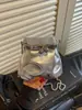 Exquisito bolso pequeño para mujer, nuevo modelo 2026, bolso bandolera de cadena de alta gama, bolso de cierre mini moderno estilo coreano
