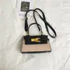 Bolsa trapezoidal transfronteiriça, bolsa quadrada pequena color block fashion, bolsa de ombro e transversal simples para mulheres