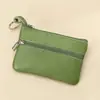 Billetera pequeña de color sólido de piel de vaca de capa superior, monedero portátil, mini ultra-delgada de cuero con cremallera, monedero para mujer, venta directa de fábrica