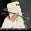 Óculos para Miopia Feminino Aro de Fio Prata Armação de Titânio Ultraleve Atmosfera de Alto Padrão Adequado para Rosto Limpo com Receita Fábrica de Armações de Óculos Danyang