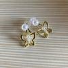 Pendientes 2026 Nuevos de Gran Venta Estilo de Lujo Doble Uso Moño Perla Aguja de Plata Pendientes de Gama Alta Otoño e Invierno Fábrica al por Mayor