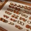 Pendientes de Chica de Hardware Femeninos Franceses Vintage Marrones Simples de Moda Pendientes Maillard para Mujeres