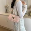 Bolso de moda de estilo coreano para mujer, nuevo bolso de viaje sencillo de color sólido con diseño de mariposa, pequeño bolso cuadrado, elegante bolso cruzado con cadena, 2024