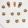 Joyería de uñas de dibujos animados 2023 Nuevo Oso de Fresa Escarchado Cabeza y trasero de Perro Pudín Decoración de uñas de resina linda