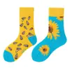 Calcetines originales de moda infantil AB color asimétrico dibujos animados longitud media otoño e invierno caramelos lindos calcetines de algodón para niños y niñas