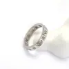 Directo de fábrica Transfronterizo europeo y americano Diamante Números romanos Acero de titanio Anillo para mujer Moda Anillo de pareja Joyería al por mayor