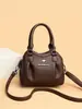 Bolsa Transversal Feminina 2026 Nova Bolsa de Mão em Couro Macio Bolsa de Ombro Simples Versátil para Mães de Meia-Idade Comércio Exterior Transfronteiriço