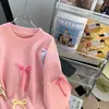 Suéter Rosa con Moño Estilo Perezoso para Mujer Otoño e Invierno 2025 Nuevo Suelto Ropa Exterior Dulce Reductor de Edad Tejido Trendy