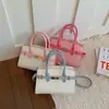 Bufanda lisa de color sólido para mujer 2026 casual nueva moda gran capacidad elegante bandolera de un solo hombro bolso cuadrado pequeño
