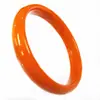 Pulsera plana naranja 10 yuanes imitación de jade de vidrio imitación de jade ágata pulsera Suministro de primera mano del Lago Jade Dragón Amarillo