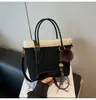 Bolso de gamuza para mujer 2026 nuevo moderno vintage otoño e invierno nicho retro bolso de mano bandolera cruzada cubo bolso de mano moderno