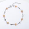 Pulsera de acero inoxidable Jinyiyuan colorida con forma de corazón de aceite goteado + flor de crisantemo de seis pétalos joyería que combina con todo
