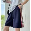 Pantalones Cortos Casuales de Verano Nuevos de Estilo Coreano High Street Retro con Raya Lateral Sueltos Versátiles Azul Marino Deportivos para Mujer