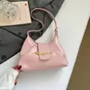 Bolsa Tote Estilosa Nova Primavera Casual Chic Bolsa de Ombro de Braço Bolsa Transversal Fashionable de Alto Valor para Mulheres