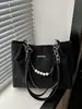 Bolsas Femininas Atacado Primavera 2026 Novo Versátil Estilo Executivo Corrente de Pérola Texturizada Grande Capacidade Casual Bolsa de Ombro Tote