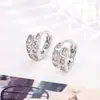 Cuff de Oreja Completo de Diamante Cola de Serpiente Pendiente Súper Brillante Cierre Exquisito de Alto Grado Temperamento Pendiente de Lujo Ligero Anillo para Cartílago de Oreja Nuevo Pendiente 2026