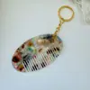 Colgante de Llave Peine Nuevo Estampado de Leopardo Transfronterizo Acetato de Gama Alta Peine para Flecos Colgante de Llavero Bolso Portátil