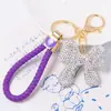 Llavero de Arco de Arcilla Cordón de Cuero Pequeño Regalo Pedrería Colgante de Llave de Metal Yiwu Pequeño Artículo Mayorista Transfronterizo