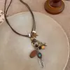 ¡Estilo Viejo Dinero Estilo Chino! Collar Colgante Marrón para Mujer, Cadena de Clavícula de Lujo de Gama Alta de Nicho, Accesorio Largo de Verano