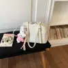 Bolso de Mano Pequeño de Alta Gama Transfronterizo para Mujer, Nuevo Bolso Versátil de Hombro o Axila Primavera 2026, Popular Bolso Tote Cruzado