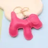 Pendente de bolsa de couro PU para cães grandes japonês e coreano transfronteiriço, moda criativa, couro de dupla face, filhote de cachorro, estilo europeu e americano, pingente de chaveiro